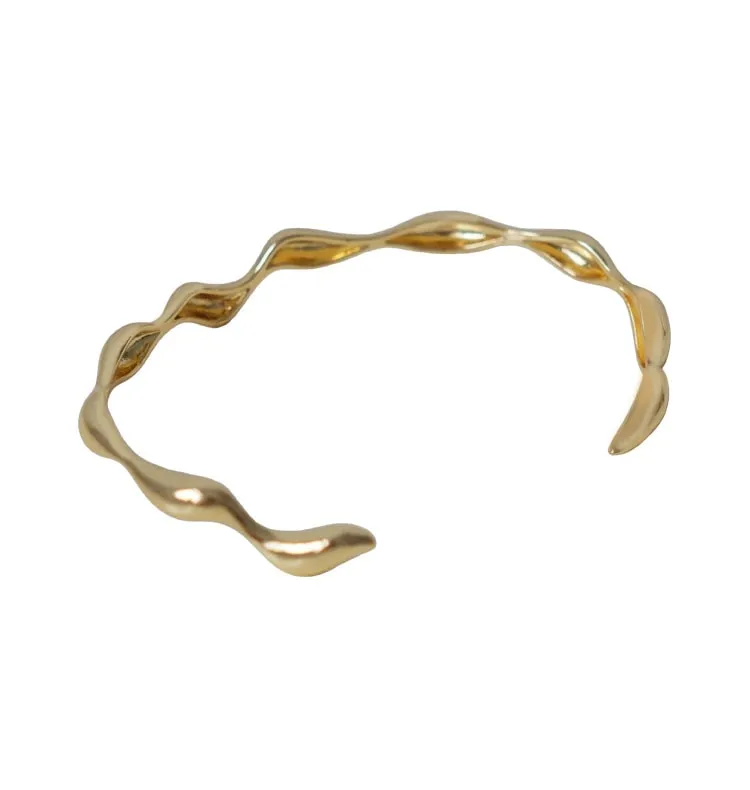 Wos Zenaida armring gull bølget 6,5 cm stål